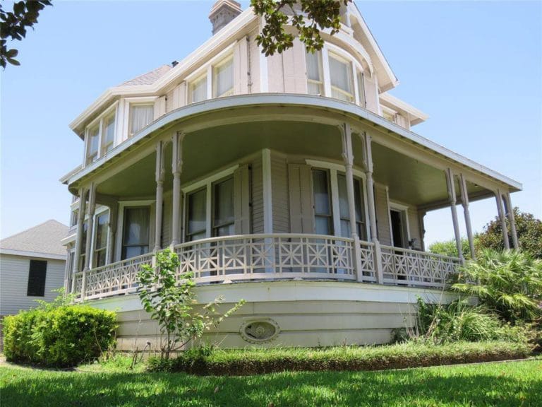 19th Century Queen Victorian home outside porch before renovations